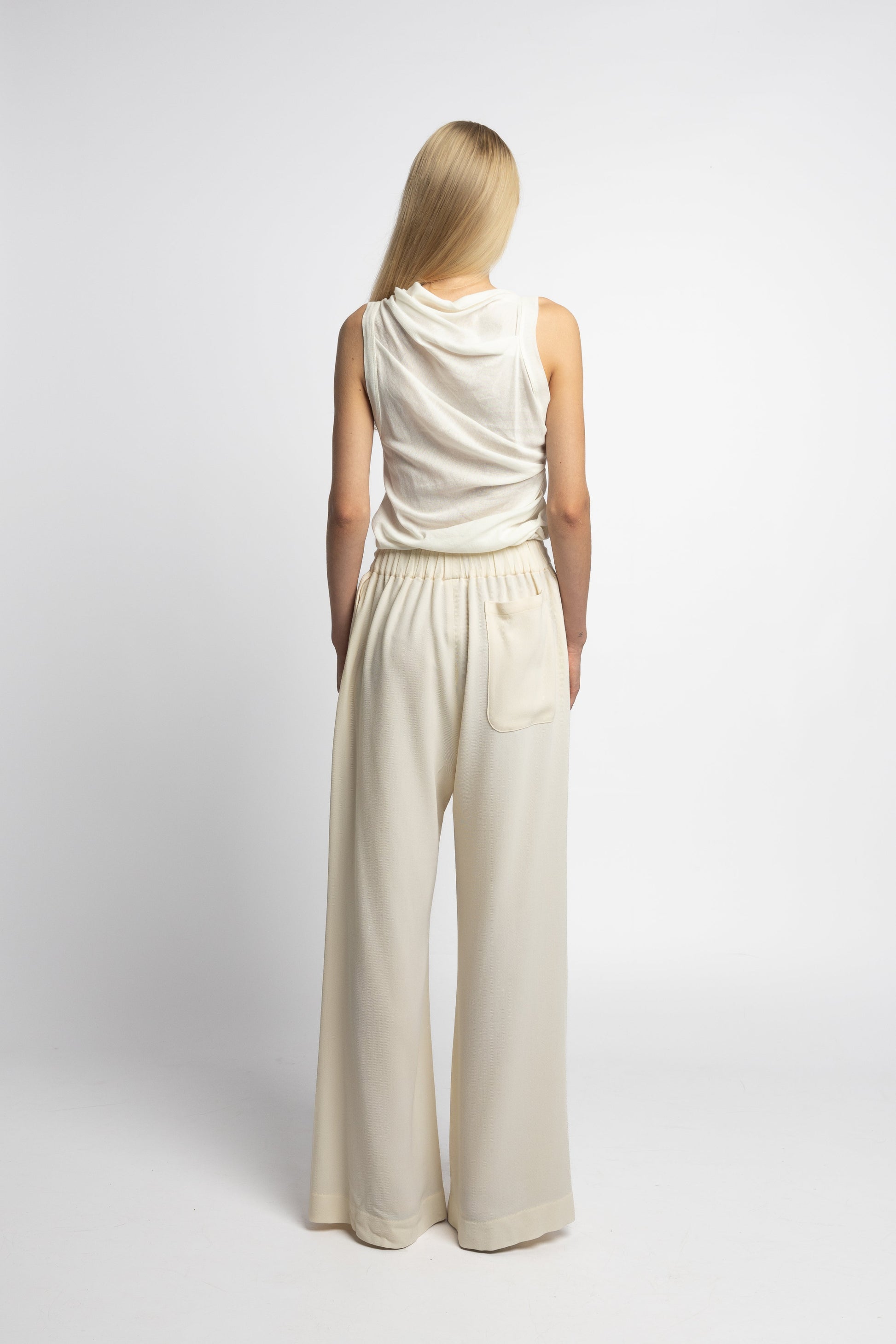 Back view of pants with patch pocket and elastic waistband