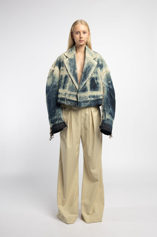 Model wearing Hoffman Distress Denim Jacket in blue oversized fit