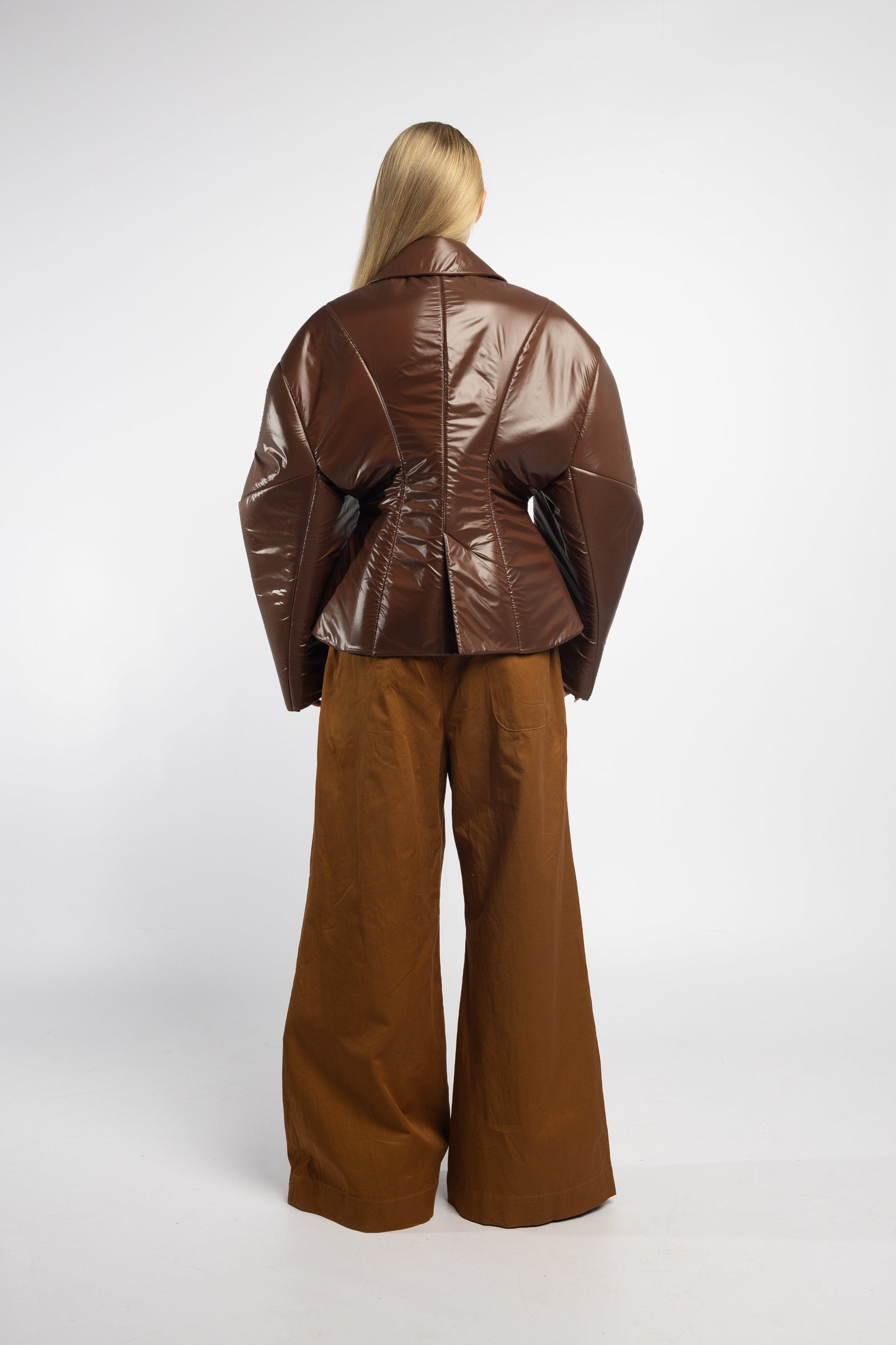 Chocolate nylon hybrid puffer with structured fit