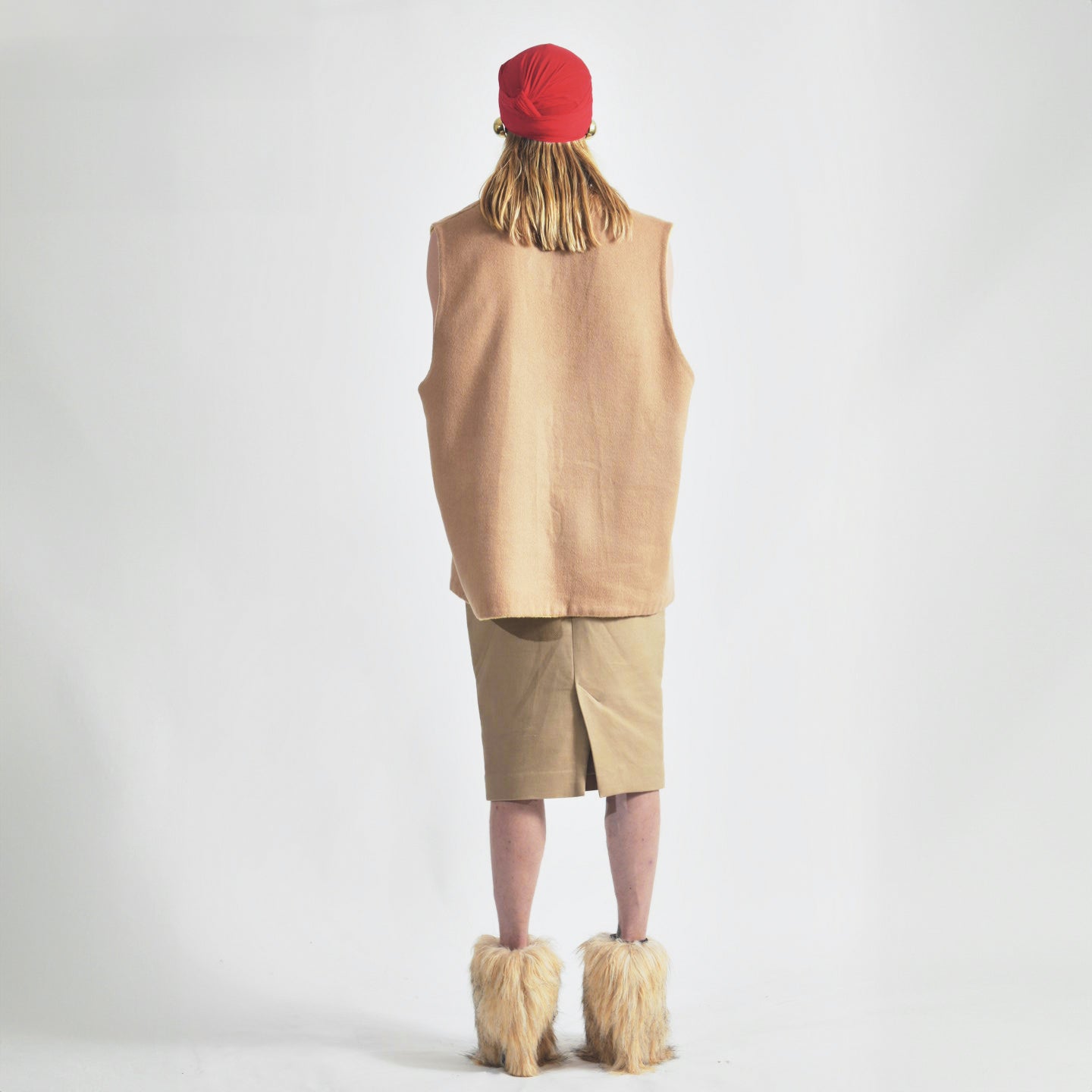 Tan Back view of reversible oversized wool vest with soft brushed texture and hand finishing, showing first reversible side