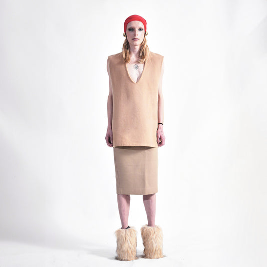 Front view of reversible oversized wool vest with soft brushed texture and hand finishing, showing Tan side