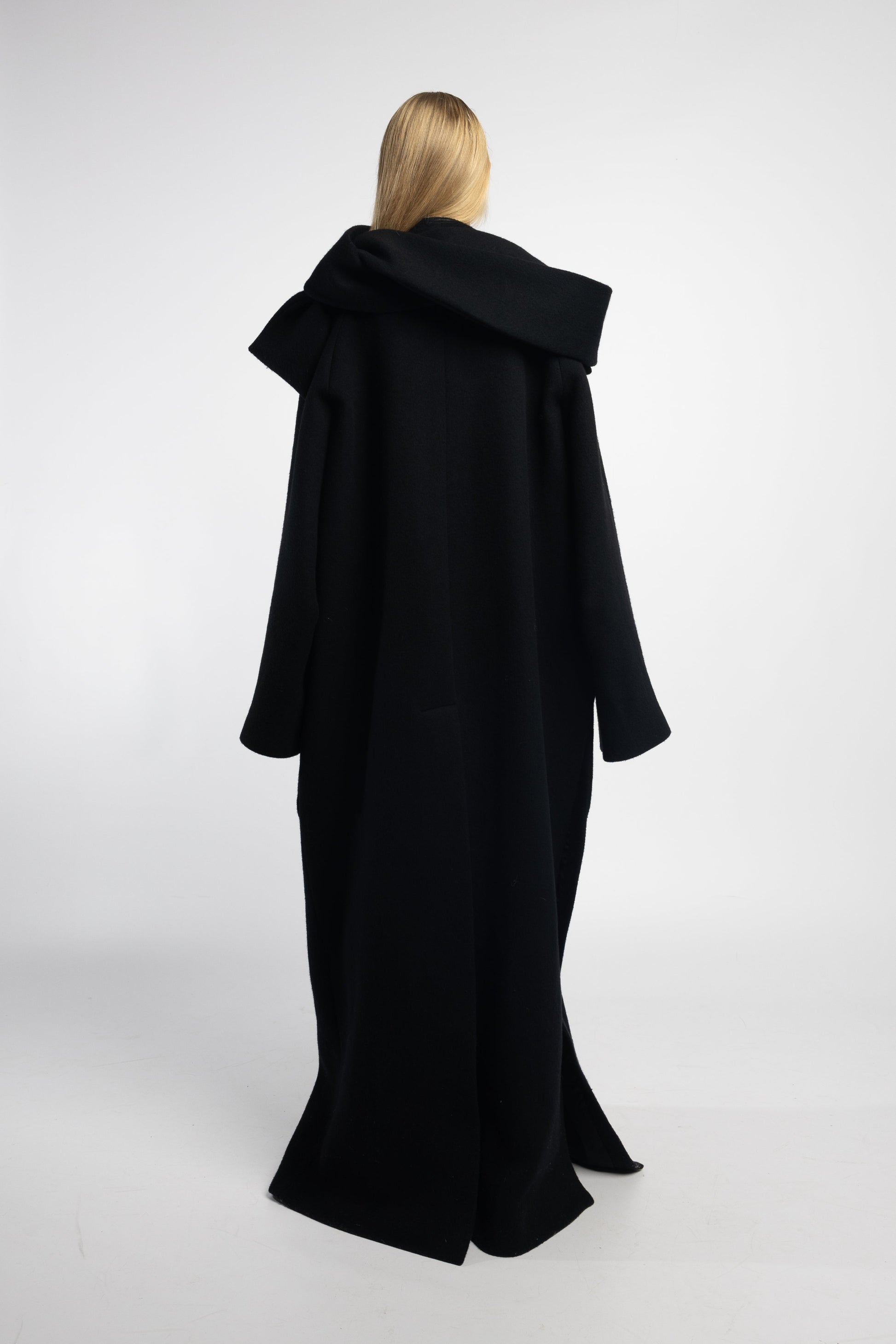Back view of scarf collar coat with vent and slit