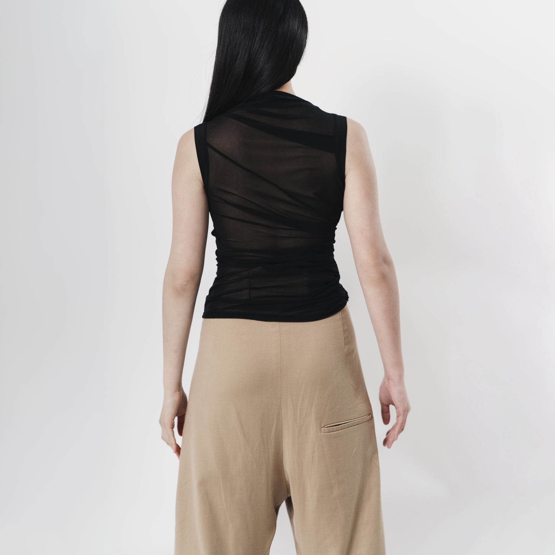 Sheer Black draped top knit fabric. back view .  New Zealand Sale