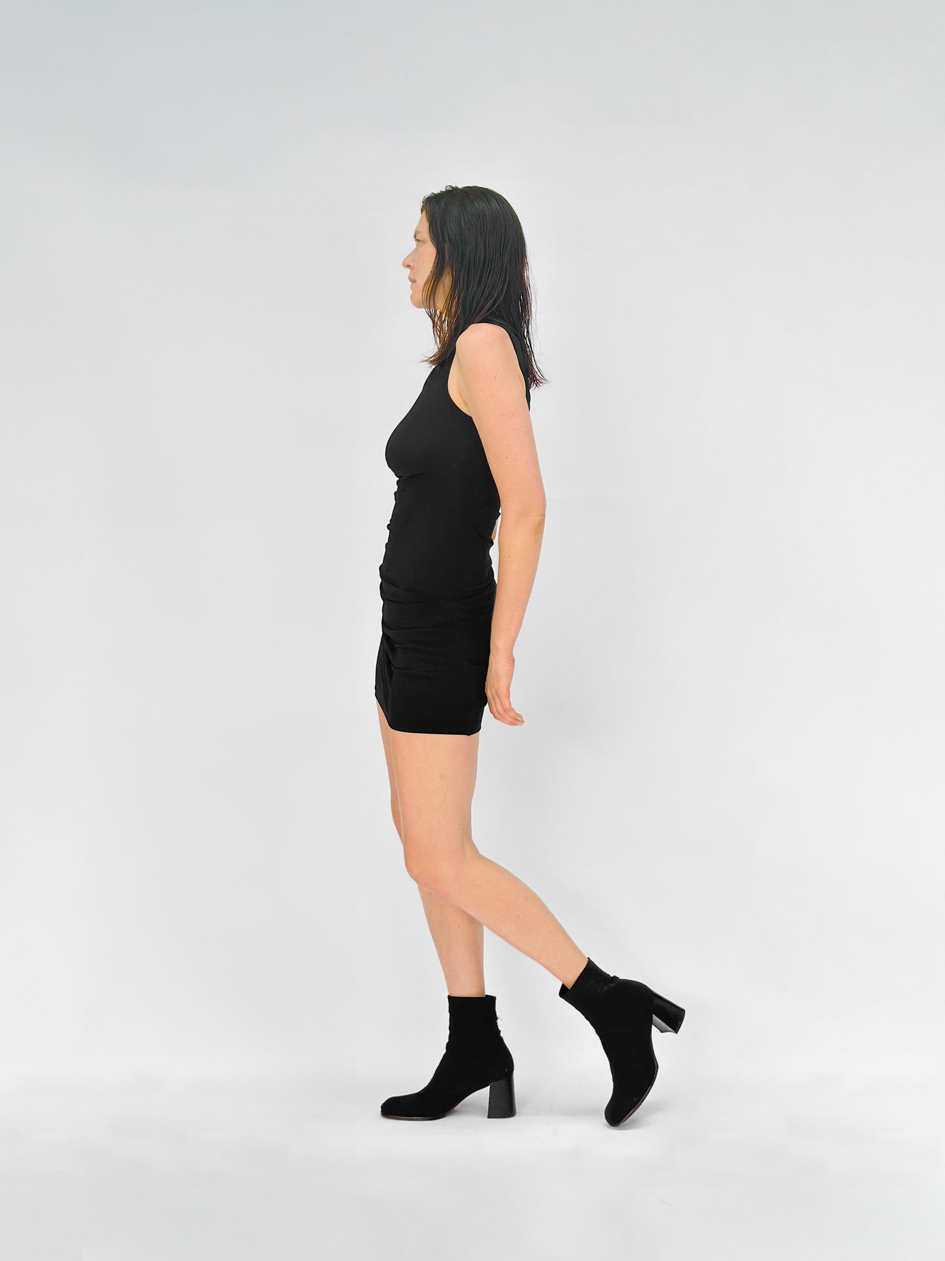 Paloma Mini Dress Side View - Black with Elegant Pleated Drapes