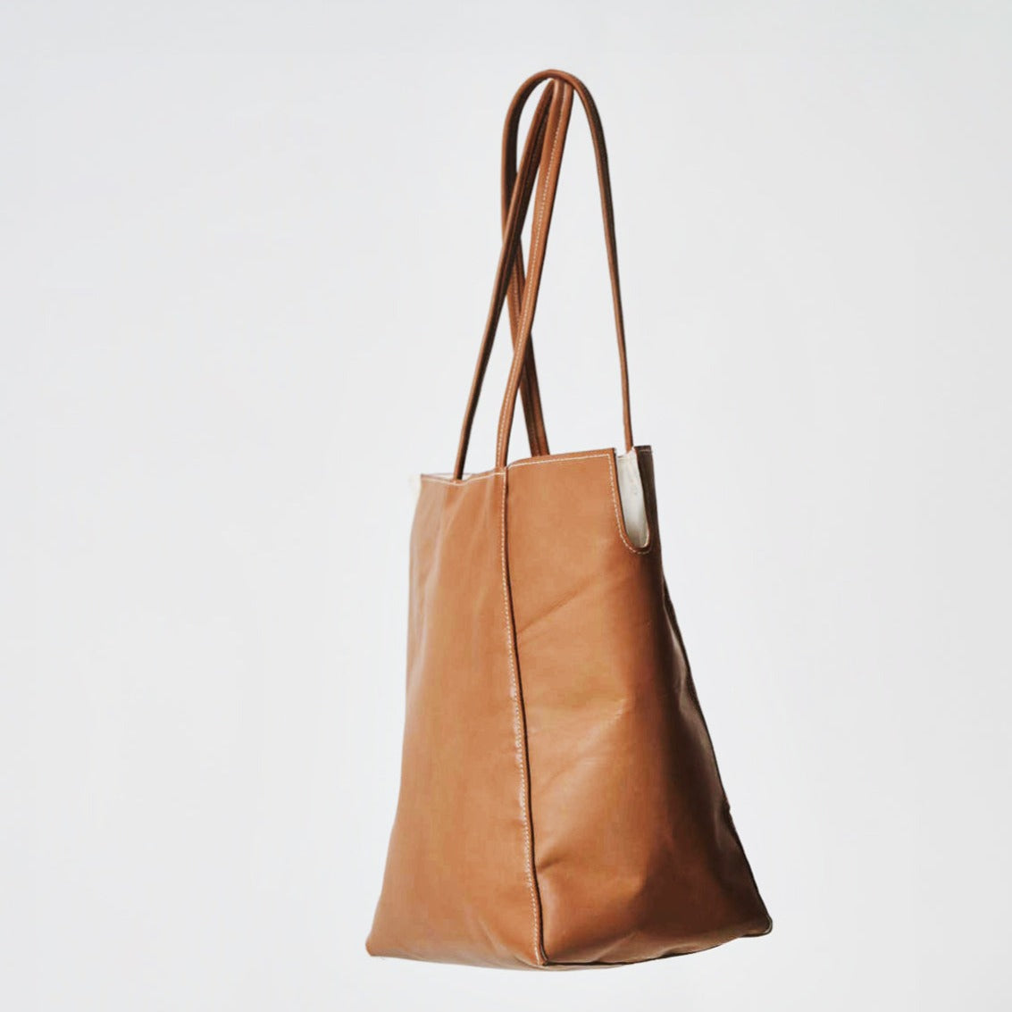 Chucker Tote Tan Lambskin - Side View dead-stock material.