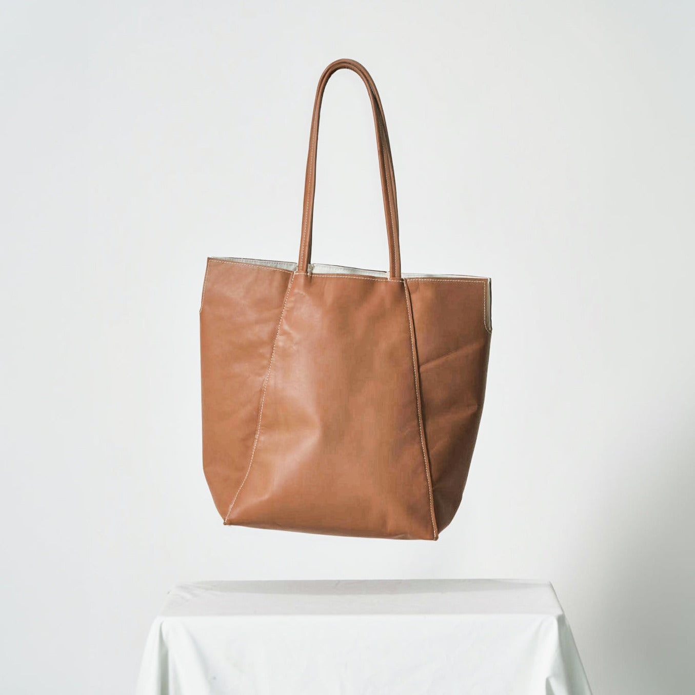 Chucker Tote Tan Lambskin - Back View dead-stock material.