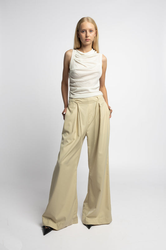 Model wearing Brat Doll Pant in pear sorbet wool-cashmere