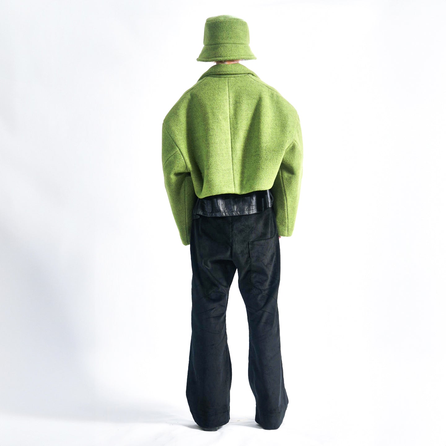 Back view of the Hoffman Hybrid Puffer jacket in colour Moss displaying its structured fit and Wool outer layer.