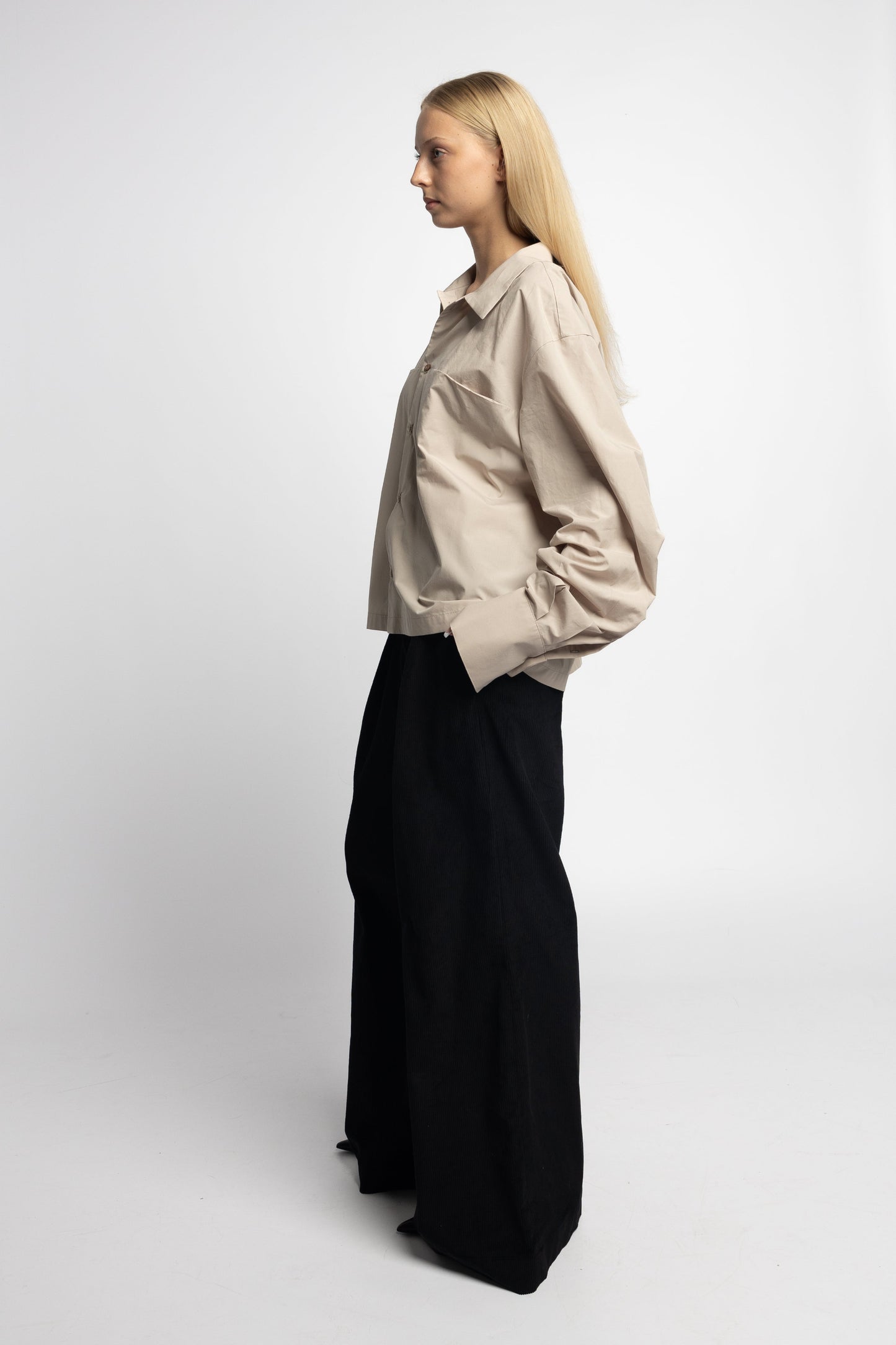 Oversized sand cotton shirt with bold cuffs