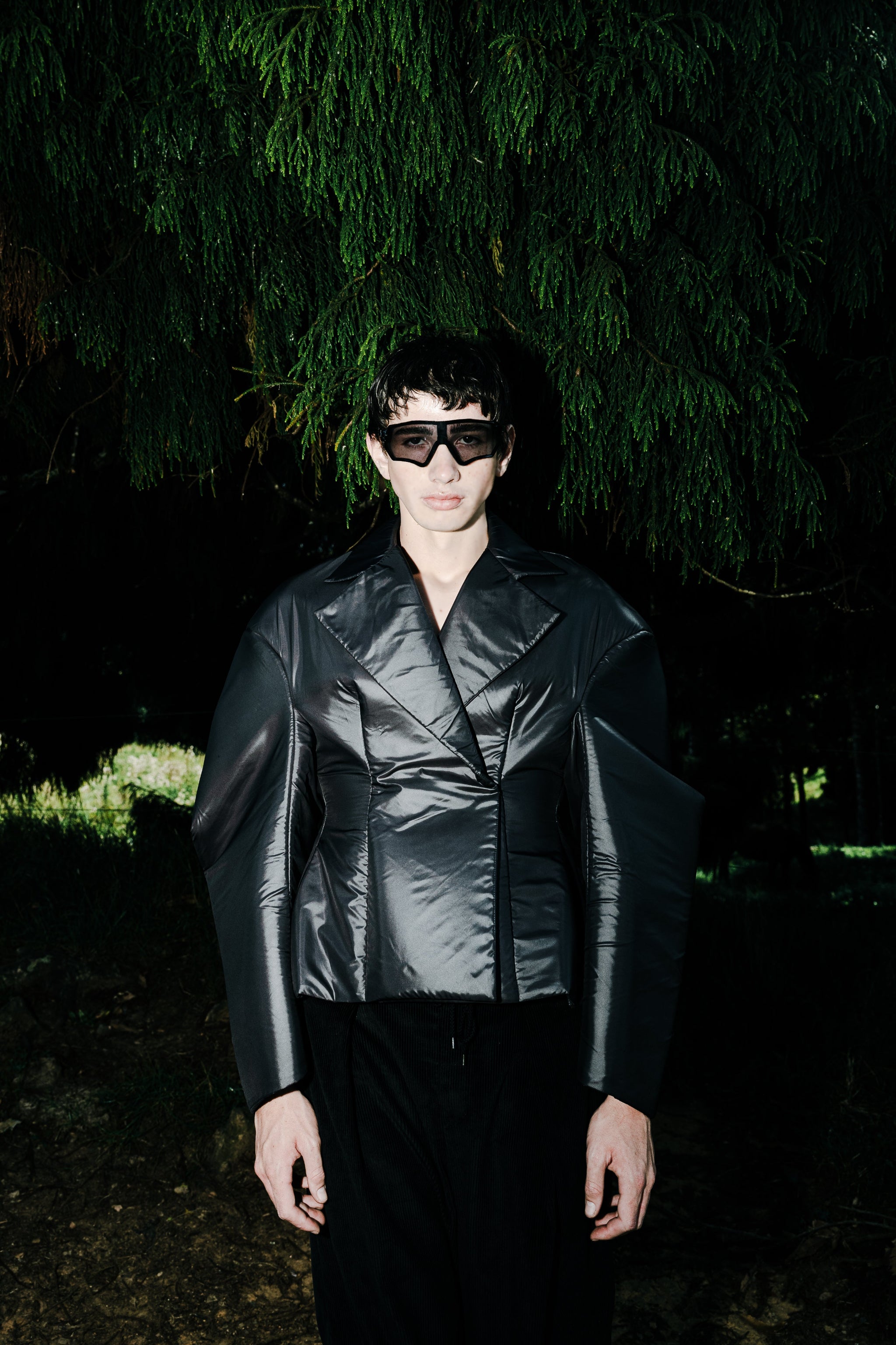 Model in black fitted hybrid jacket campaign shoot