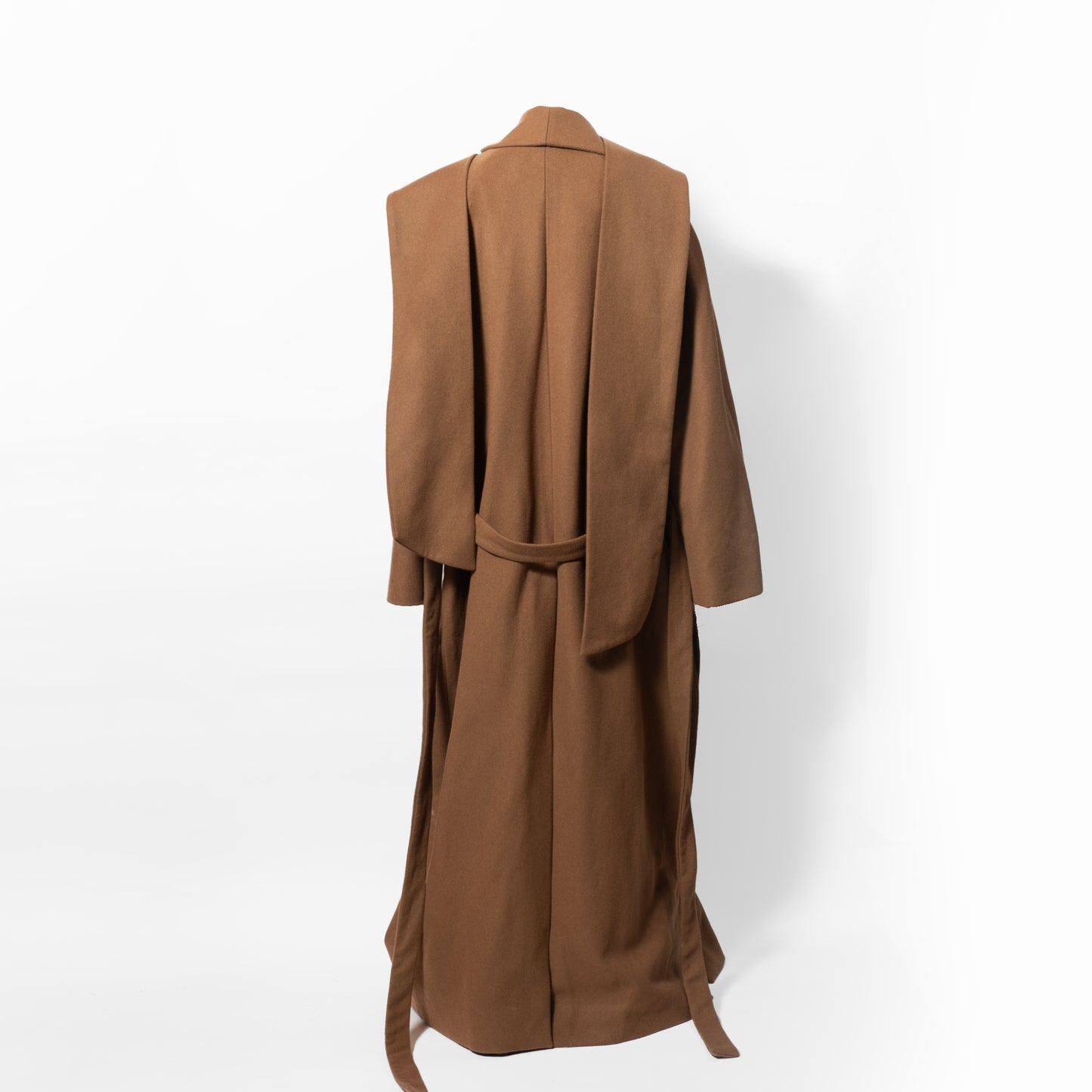 Oversize Floor length Tobacco Brown Coat with 2 oversized pocket, Elongated Collar and 3 way wear sleeve. Side slit and back vent. Back view ghost image 